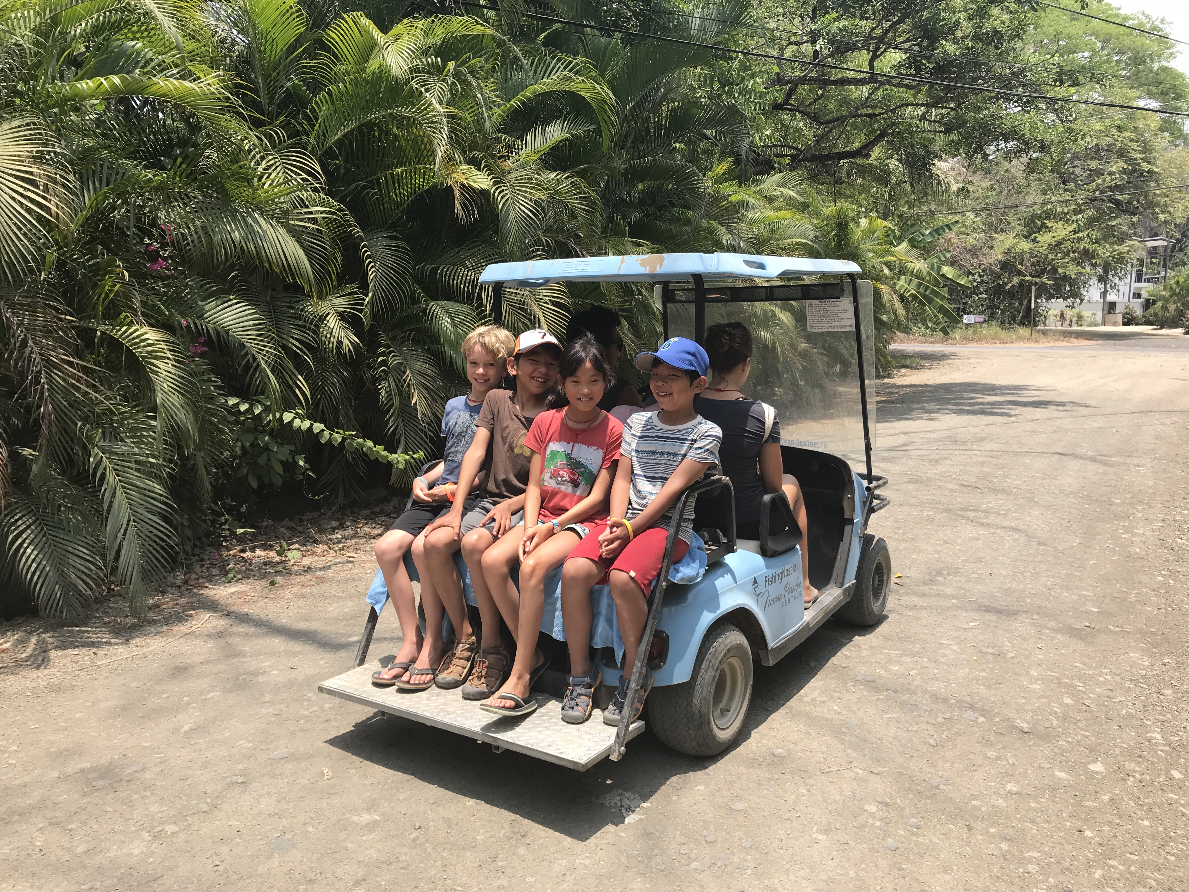 playa guiones, nosara, costa rica, golf cart